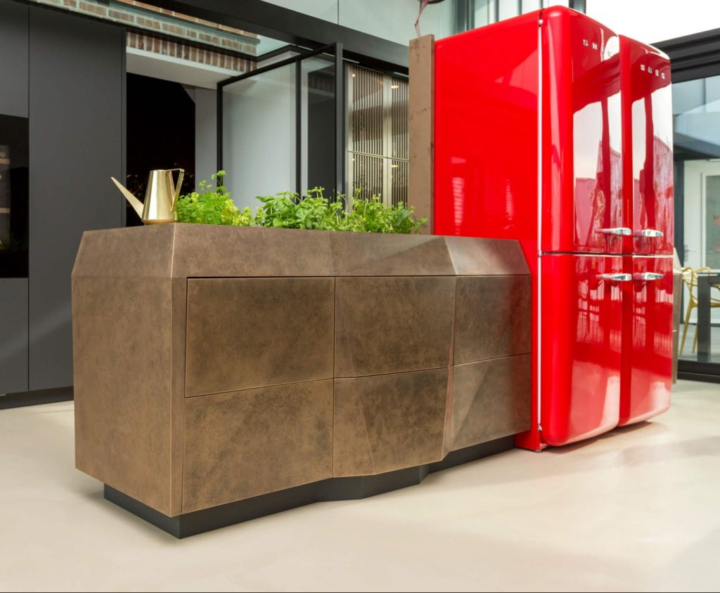 keuken laten maken, keuken bouwer, op maat keukens, op maat gemaakte keukens, luxe keukens, vogels keukens Helmond, Nuenen, Waalre, Stiphout, Liessel, Helmond, Eindhoven, Bladel, Pijnacker, Rotterdam Vlakinbouw inductiekookplaat - Keuken in Regio Rotterdam, Koperkleurige spoelbakRonde deuren hoge kast, Composiet werkblad, Recirculatie schuine afzuigkap, Ronde vormen bij keuken, Keukenblad van Balsabeton "Robuste", Apparatenwand met rustiek eiken fineer, Wandmeubel passend bij keuken, Keukeneiland met Balsabeton werkblad, Industriële keuken met betonnen blad, Quooker reservoir weggewerkt achter ladefrontenDoorlopende houtnerf in fronten, Twist stopcontact in werkblad, Betonnen aanrechtblad met vlakinbouw kookplaat, Kookeiland met eiken fineer greeplijsten, Schiereiland met laden push-to-open, Inductiekookplaat met geïntegreerde afzuiging, Elektrische push-to-open op een koelkast,RVS keukenblad met vlakinbouw inductiekookplaat, Maatkeuken in Utrecht, Volledig geïntegreerde spoelbak in rvs keukenblad, Knoppen Bora Professional, Bora geïntegreerde afzuiging, Bora Professional, Oven onder het aanrechtblad, RVS keukenblad met spuitwerk fronten, luxe keukenapparatuur in maatwerk keuken, digitale tekening keuken op maat, technische tekening kastenwand, stopcontacten maatwerk kookeiland, besteklade op maat keuken, modern rvs keukenblad werkblad op maat, landelijke keuken op maat met kookeiland, maatwerk rvs keukenblad met glazen achterwand, smeg koelkast in moderne maatwerk keuken, deurrek kastsysteem in staande keukenkast op maat, lemans keukensysteem keukenkast, afvalemmers en afvalsortering kastsysteem keukens, apothekerskast keukenkastsysteem, magic corner keukenkastsysteem, technische tekening keuken op maat, sample materialen keuken op maat, luxe keukenkast op maat met spuitwerk, moderne abstracte keukenkast op maat